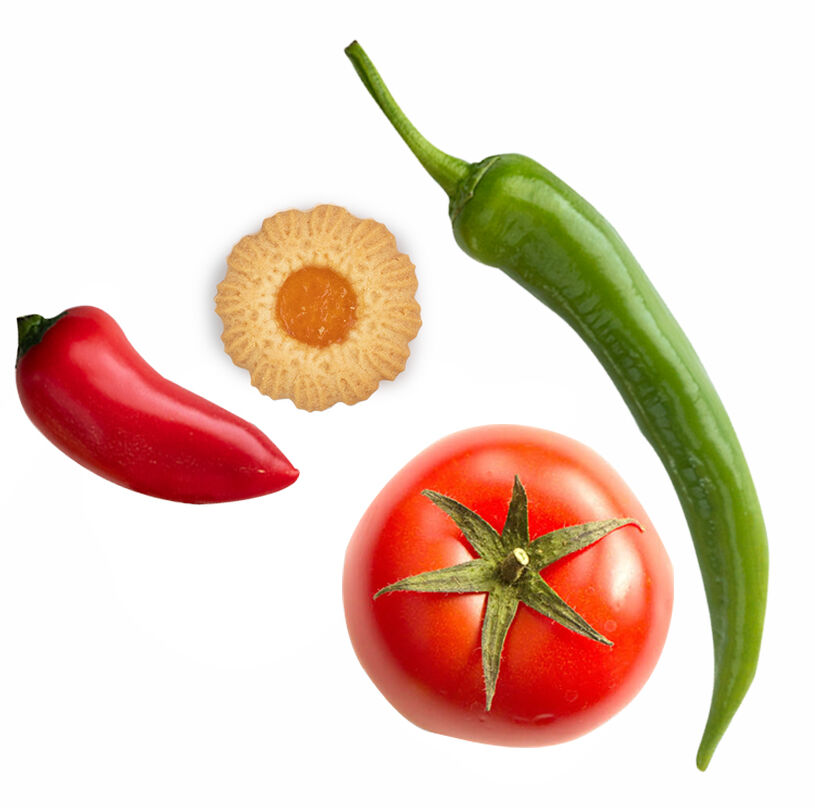 Sortiment infood Bild zeigt Pfefferoni, Paprika, Tomate und Keks.